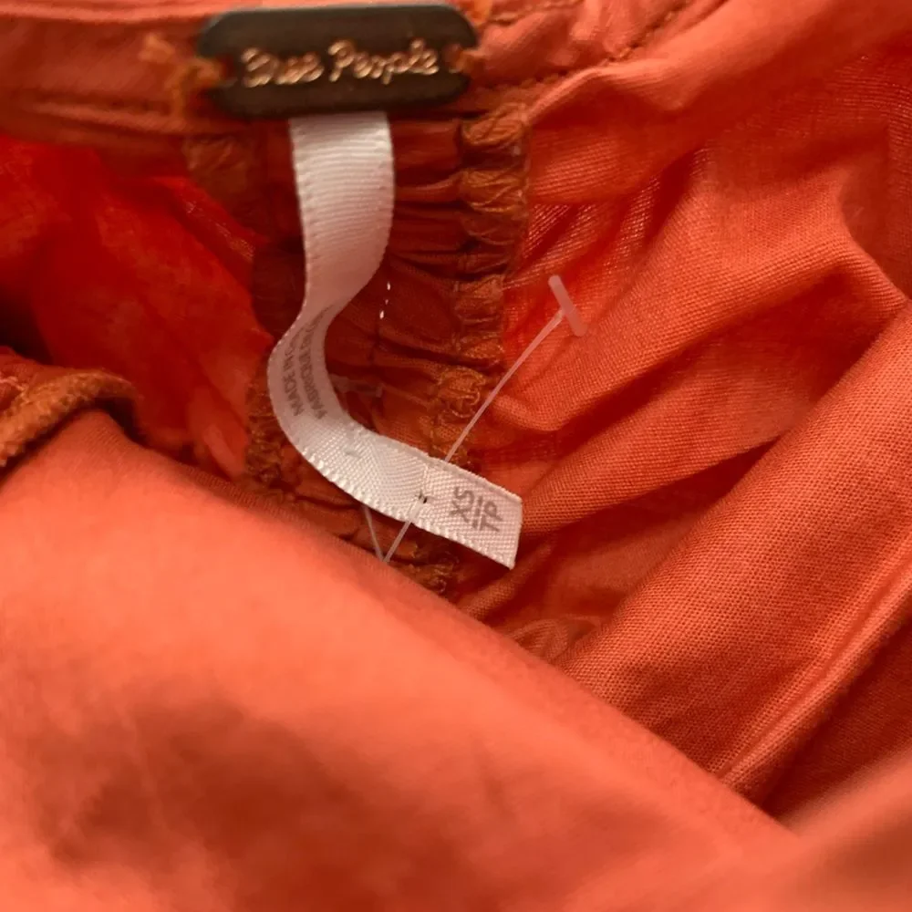NWT Free People Women's Hold On Mini Dress in color red rust. Size XSmall